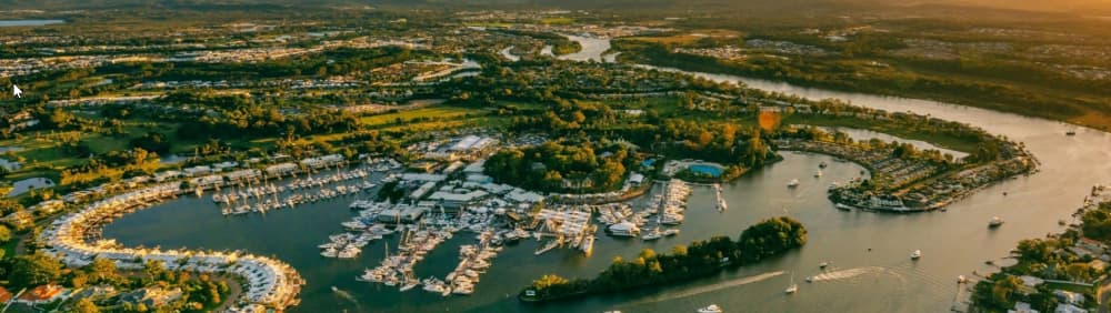 On the Coomera River Located within the picturesque surrounds of Sanctuary Cove, the Marina enjoys direct access to the Pacific Ocean via the protected waterways of the Gold Coast Broadwater (without height restrictions) and the Coomera River.